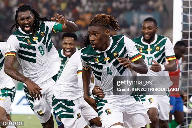 Cameroon's defender Christopher Wooh celebrates scoring his team's third goal during the Africa Cup of Nations 2024 group C football match between...