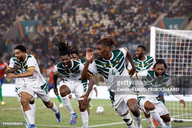 Cameroon's defender Christopher Wooh celebrates scoring his team's third goal during the Africa Cup of Nations 2024 group C football match between...