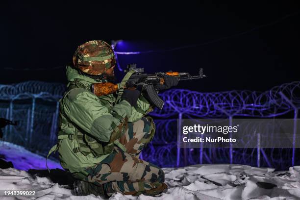 Indian Army soldiers are patrolling the Line of Control , which divides India and Pakistan, amid harsh weather conditions at a forward post in the...