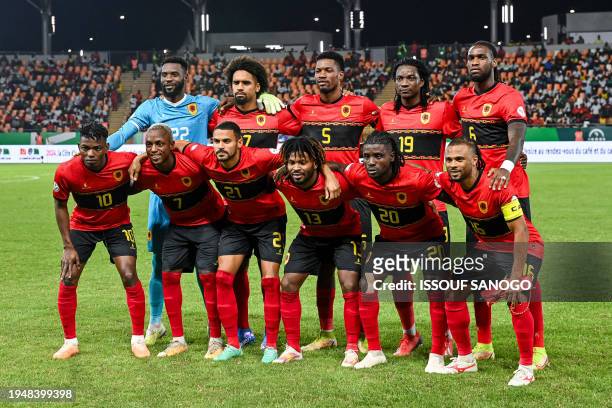 Angola's players pose ahead of the Africa Cup of Nations 2024 group D football match between Angola and Burkina Faso at Stade Charles Konan Banny in...