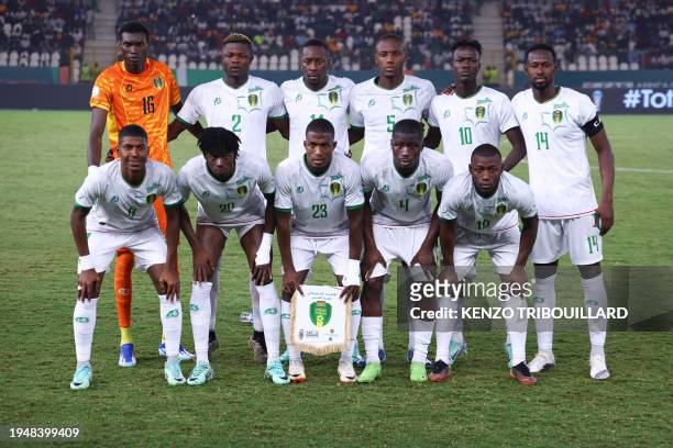 Mauritania's team pose for a team photo ahead of the Africa Cup of Nations 2024 group D football match between Mauritania and Algeria at Stade de la...