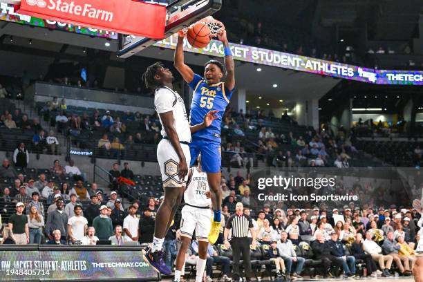 Pittsburgh forward Zack Austin dunks during the college basketball game between the Pittsburgh Panthers and the Georgia Tech Yellow Jackets on...