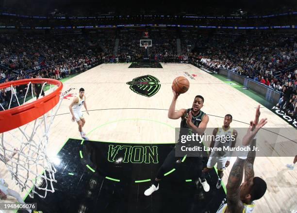 McCollum of the New Orleans Pelicans drives to the basket during the game against the Utah Jazz on January 23, 2024 at the Smoothie King Center in...