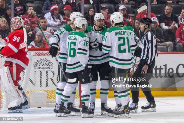 Jamie Benn of the Dallas Stars celebrates his goal with teammates during the first period of the game against the Detroit Red Wings at Little Caesars...