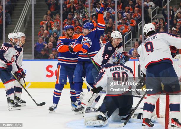 Warren Foegele and Evander Kane of the Edmonton Oilers celebrate a goal in the third period against the Columbus Blue Jackets at Rogers Place on...