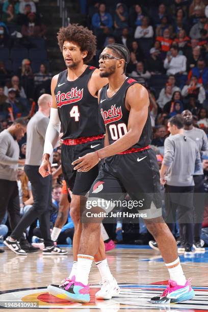 Scoot Henderson and Matisse Thybulle of the Portland Trail Blazers look on during the game against the Oklahoma City Thunder on January 23, 2024 at...