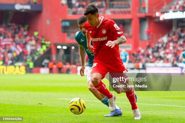 Brian Rubio of Mazatlan fights for the ball with Claudio Baeza of Toluca during the 2nd round match between Toluca and Mazatlan FC as part of the...