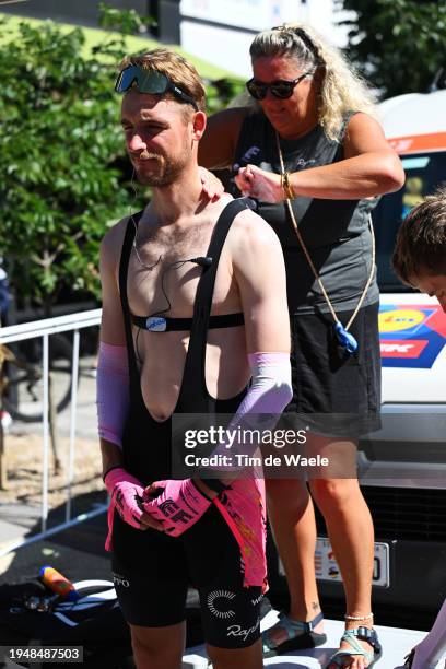 An assistant applies sunscreen to Jonas Rutsch of Germany and Team EF Education - Easypost prior to the 24th Santos Tour Down Under 2024, Stage 6 a...