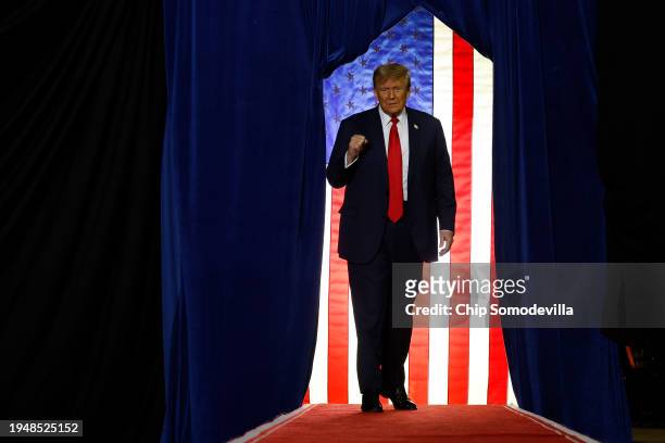 Republican presidential candidate and former President Donald Trump takes the stage during a campaign rally at the SNHU Arena on January 20, 2024 in...
