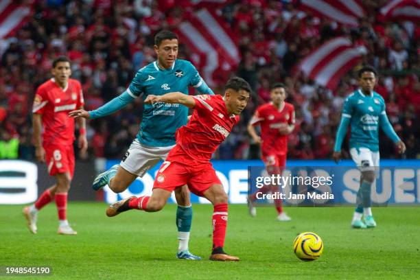 Andres Montano of Mazatlan fights for the ball with Juan Dominguez of Toluca during the 2nd round match between Toluca and Mazatlan FC as part of the...