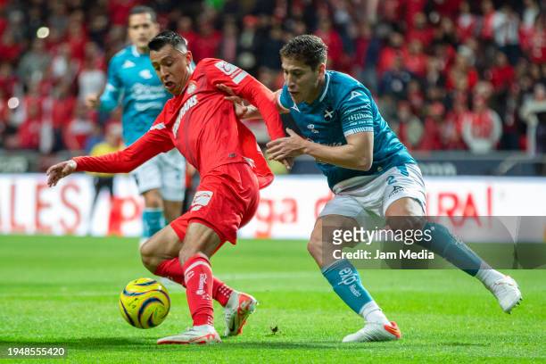 Juan Dominguez of Toluca fights for the ball with Luis Olivas of Mazatlan during the 2nd round match between Toluca and Mazatlan FC as part of the...