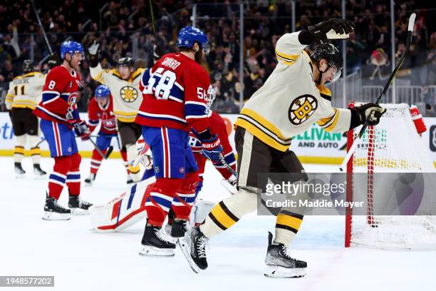 Danton Heinen of the Boston Bruins celebrates after scoring against the Montreal Canadiens during the first period at TD Garden on January 20, 2024...