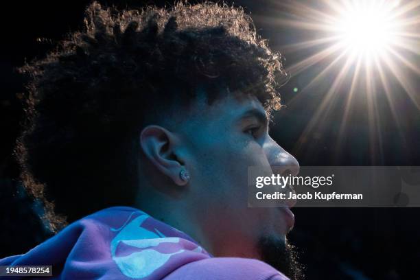 LaMelo Ball of the Charlotte Hornets looks on before their game against the Philadelphia 76ers at Spectrum Center on January 20, 2024 in Charlotte,...