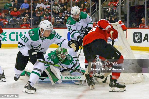 Scott Wedgewood of the Dallas Stars makes the second period save on Erik Haula of the New Jersey Devils at Prudential Center on January 20, 2024 in...