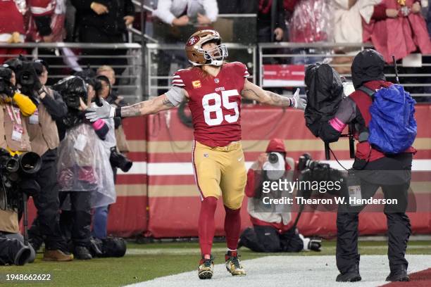George Kittle of the San Francisco 49ers celebrates after scoring a 32-yard touchdown during the second quarter against the Green Bay Packers in the...