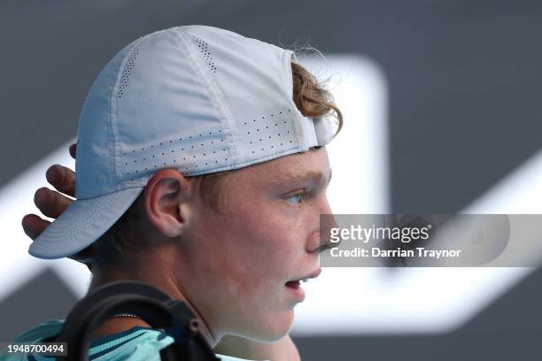Cruz Hewitt of Australia looks on in their first round singles match against Alexander Razeghi of the United States during the 2024 Australian Open...