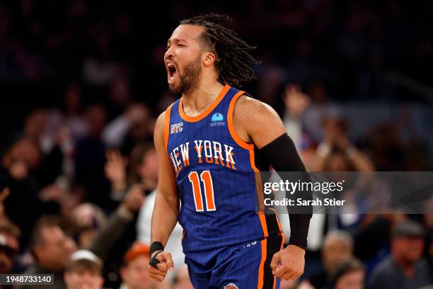 Jalen Brunson of the New York Knicks reacts after making a three-point shot during the second half against the Toronto Raptors at Madison Square...