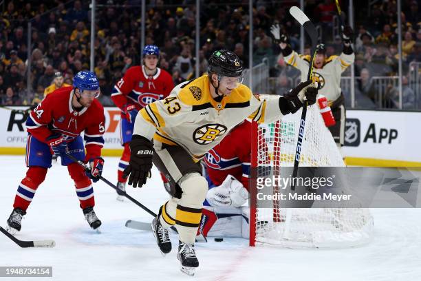 Danton Heinen of the Boston Bruins celebrates after scoring a hat trick goal against the Montreal Canadiens during the third period at TD Garden on...