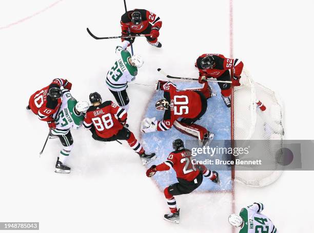 Nico Daws and the New Jersey Devils defend against the Dallas Stars at Prudential Center on January 20, 2024 in Newark, New Jersey. The Stars...