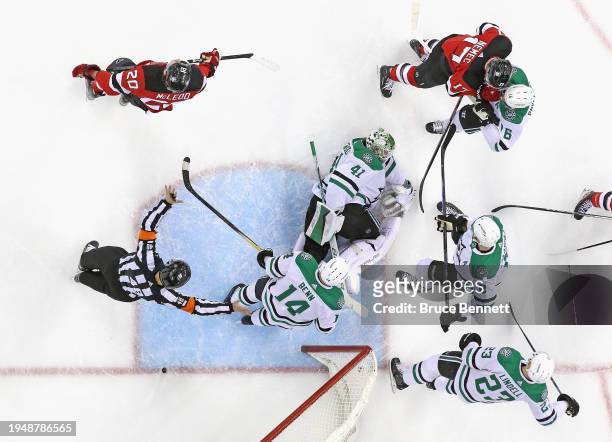 Scott Wedgewood of the Dallas Stars makes the save against the New Jersey Devils at Prudential Center on January 20, 2024 in Newark, New Jersey. The...