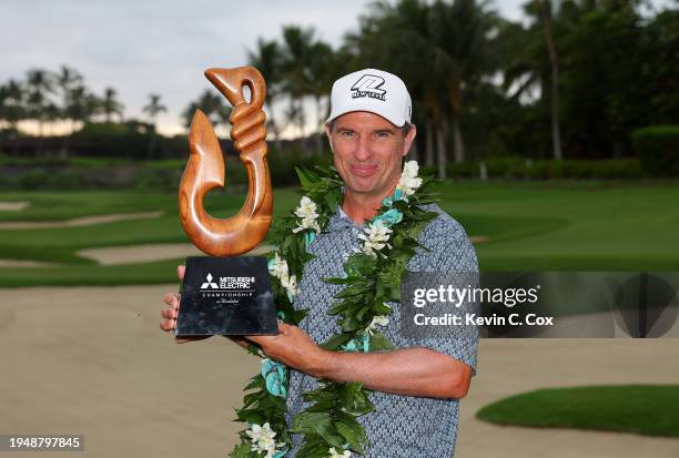 Steven Alker of New Zealand poses with the trophy after winning the PGA TOUR Champions Mitsubishi Electric Championship at Hualalai Golf Club on...