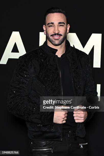 Adil Rami attends the Balmain Homme Menswear Fall/Winter 2024-2025 show as part of Paris Fashion Week on January 20, 2024 in Paris, France.