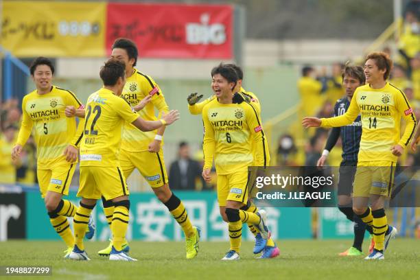 Yusuke Kobayashi of Kashiwa Reysol celebrates with teammates after scoring the team's first goal during the J.League J1 match between Kashiwa Reysol...