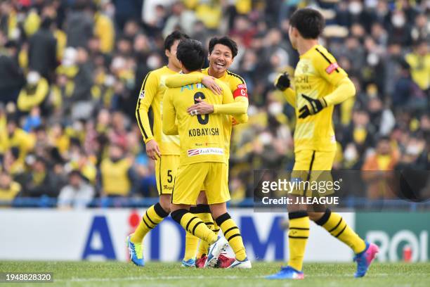 Yusuke Kobayashi of Kashiwa Reysol celebrates with teammates after scoring the team's first goal during the J.League J1 match between Kashiwa Reysol...