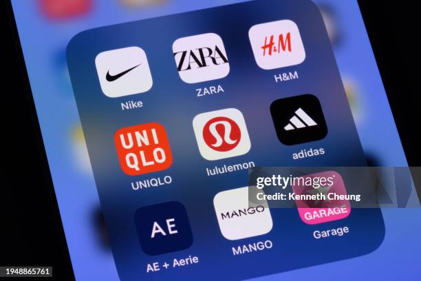 minoristas de moda en línea: nike, zara, h&m, uniqlo, lululemon, adidas, american eagle, mango, garage - marca de diseñador fotografías e imágenes de stock
