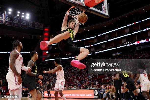 Kelly Olynyk of the Utah Jazz dunks the ball in the second half against the Houston Rockets at Toyota Center on January 20, 2024 in Houston, Texas....