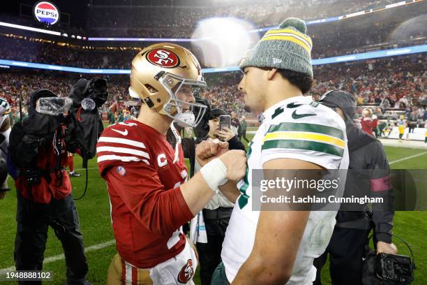 Brock Purdy of the San Francisco 49ers greets Jordan Love of the Green Bay Packers after the 49ers defeated the Packers 24-21 in the NFC Divisional...