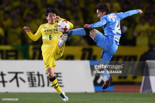 Kyohei Noborizato of Kawasaki Frontale and Yusuke Kobayashi of Kashiwa Reysol compete for the ball during the J.League J1 match between Kawasaki...