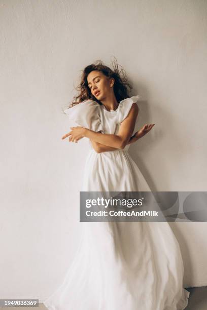 beautiful sensual woman - white dress stock pictures, royalty-free photos & images