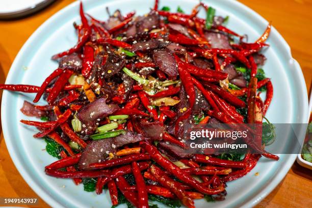 yunnan traditional dish, fried dried beef - beef jerky stock pictures, royalty-free photos & images