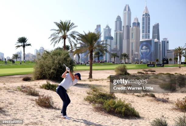 Rory McIlroy of Northern Ireland plays his second shot on the 8th hole during the second round of the Hero Dubai Desert Classic at Emirates Golf Club...