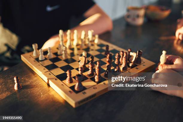 playing chess - playing board games stock pictures, royalty-free photos & images