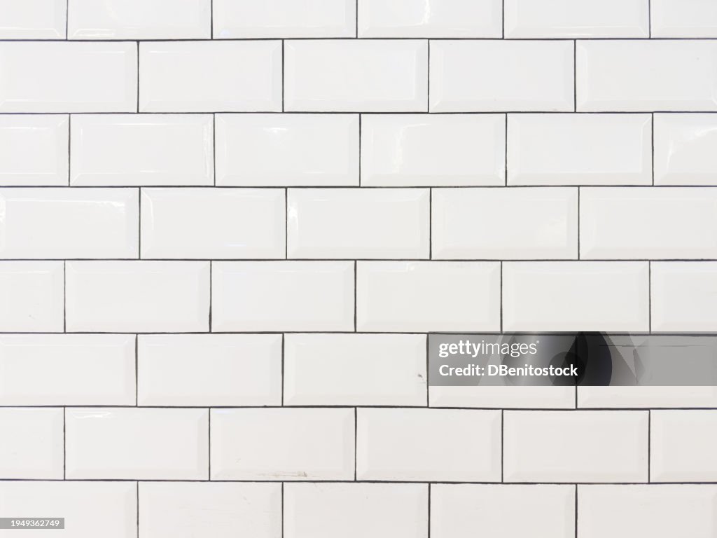 Ceramic white brick wall background. Concept of bathroom, kitchen, modern, retro, ceramic, texture