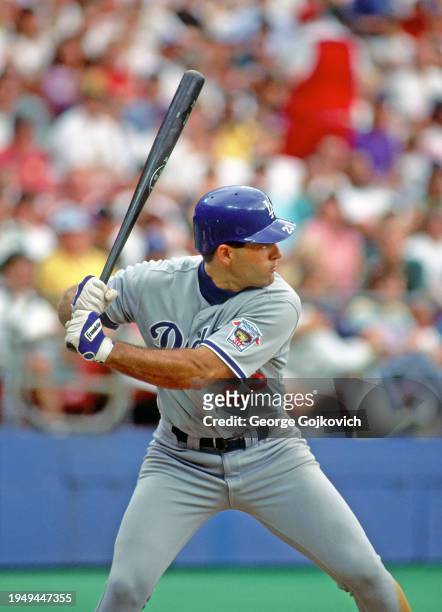 Eric Karros of the Los Angeles Dodgers bats against the Pittsburgh Pirates during a Major League Baseball game at Three Rivers Stadium in 1992 in...