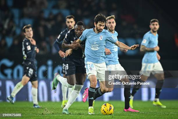 Luca de la Torre of Celta Vigo and Umar Sadiq of Real Sociedad in action during the LaLiga EA Sports match between Celta Vigo and Real Sociedad at...