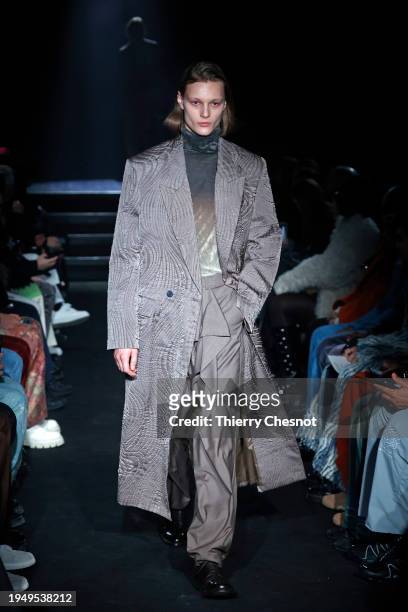 Model walks the runway during the TAAKK Menswear Fall/Winter 2024-2025 show as part of Paris Fashion Week on January 21, 2024 in Paris, France.