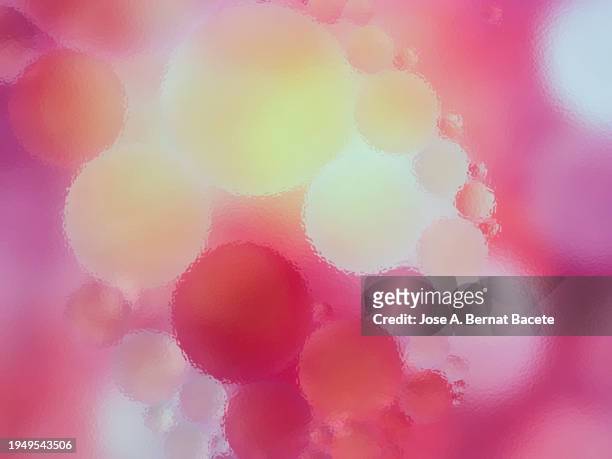 moving translucent rippled water surface on a background of pink bubbles. - bernat bacete stock pictures, royalty-free photos & images