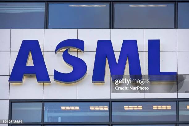 Logo of ASML - Advanced Semiconductor Materials Lithography as seen at the wall of the building at the headquarters of the company. ASML is a Dutch...