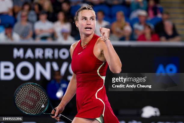 Aryna Sabalenka celebrates match point in her round four singles match against Amanda Anisimova of the United States during day eight of the 2024...