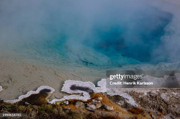 details of colourful hotspring at winter in midway geyser basin, yellowstone national park - midway geyser basin stock pictures, royalty-free photos & images