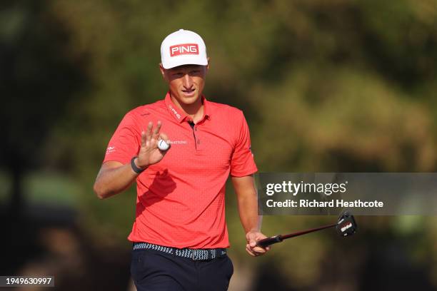 Adrian Meronk of Poland celebrates a birdie putt on the 14th green during the Final Round of the Hero Dubai Desert Classic at Emirates Golf Club on...