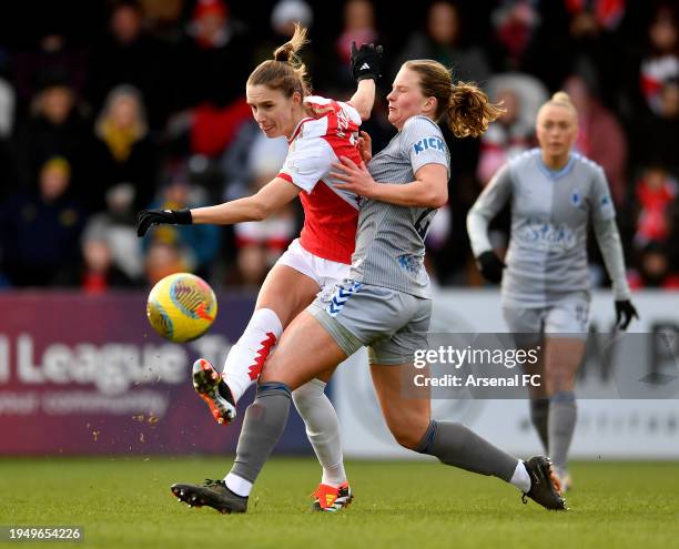 Vivianne Miedmea of Arsenal passes the ball under pressure from Elise Stenevik of Everton during the Barclays Women´s Super League match between...