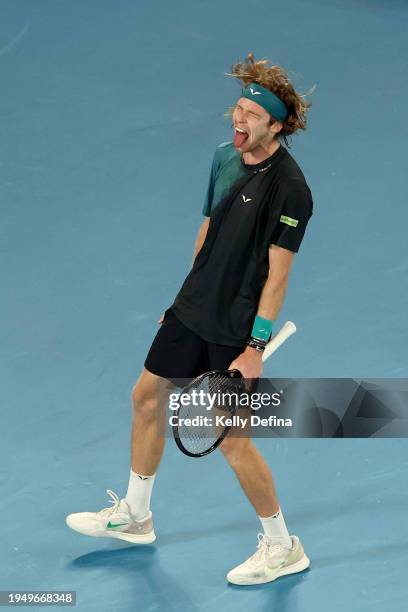 Andrey Rublev reacts in their round four singles match against Alex de Minaur of Australia during the 2024 Australian Open at Melbourne Park on...