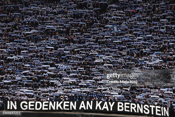 Banner is displayed in memory of Kay Bernstein, President of Hertha Berlin as fans hold their scarves aloft prior to the Second Bundesliga match...