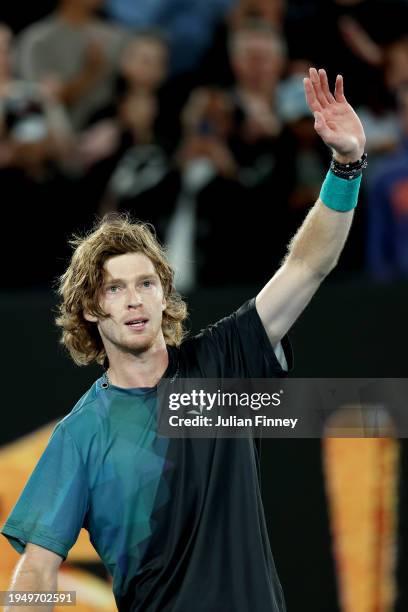 Andrey Rublev celebrates match point in their round four singles match against Alex de Minaur of Australia during the 2024 Australian Open at...