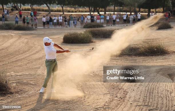 Rory McIlroy of Northern Ireland plays his second shot on the 16th hole during the Final Round of the Hero Dubai Desert Classic at Emirates Golf Club...